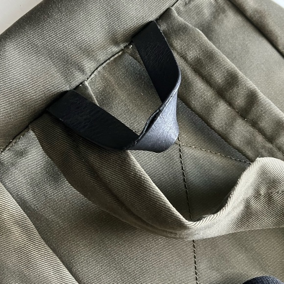 Everlane Modern Snap Backpack in distressed army green canvas - Picture 9 of 14